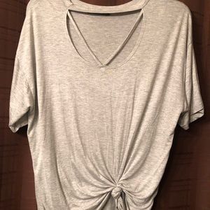 Very cute shirt. Ties in the front.